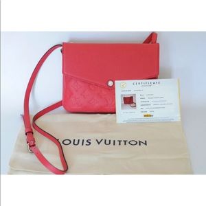 Louis Vuitton Twice bag in red Empreinte